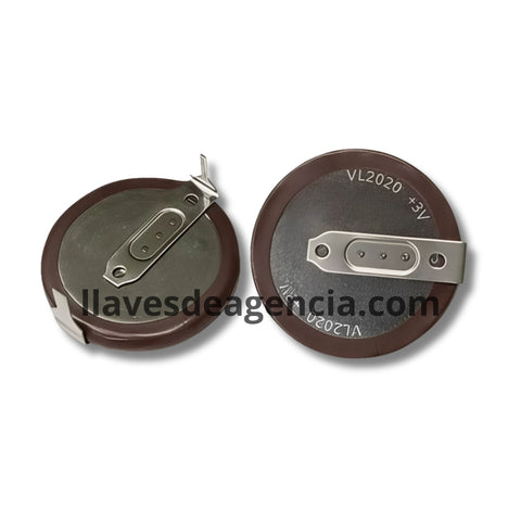 Detalle de batería recargable LIR2020 mostrando terminales soldables paralelas a 180 grados contacto en línea para llave Mini Cooper