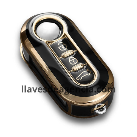 Detalle de funda protectora TPU para llave presencia Alfa Romeo negro con bordes dorados mostrando acabado suave al tacto resistente al agua y protección contra caídas arañazos