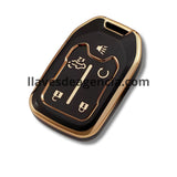 Detalle funda protectora TPU negro brillante con iconos dorados llave Chevrolet Silverado Cheyenne Colorado GMC Sierra 5 botones acabado espejo premium elegante y exclusivo
