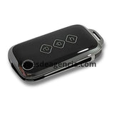 Detalle funda protectora TPU negro brillante con iconos dorados llave flip navaja Chevrolet Aveo Trax Wuling Baojun 3 botones elegante y exclusiva